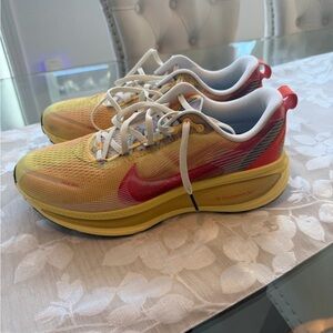 Nike Rate Color Vomero 18 ZoomX Red and Yellow Running Shoes